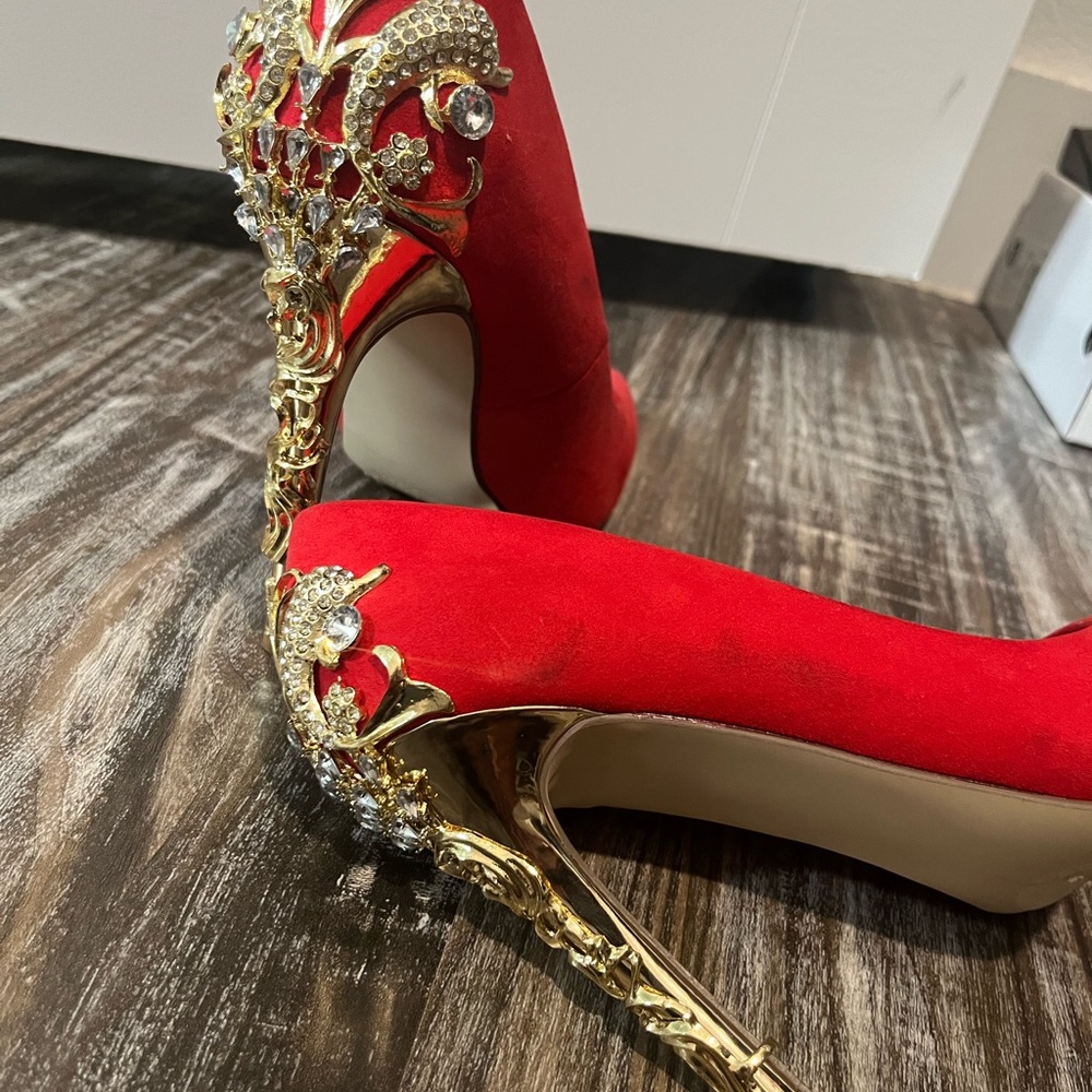 Red, jeweled heels